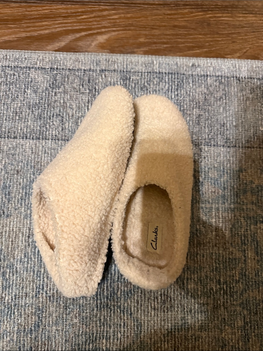 Clarks Women’s Cream Sherpa Slip-Ons